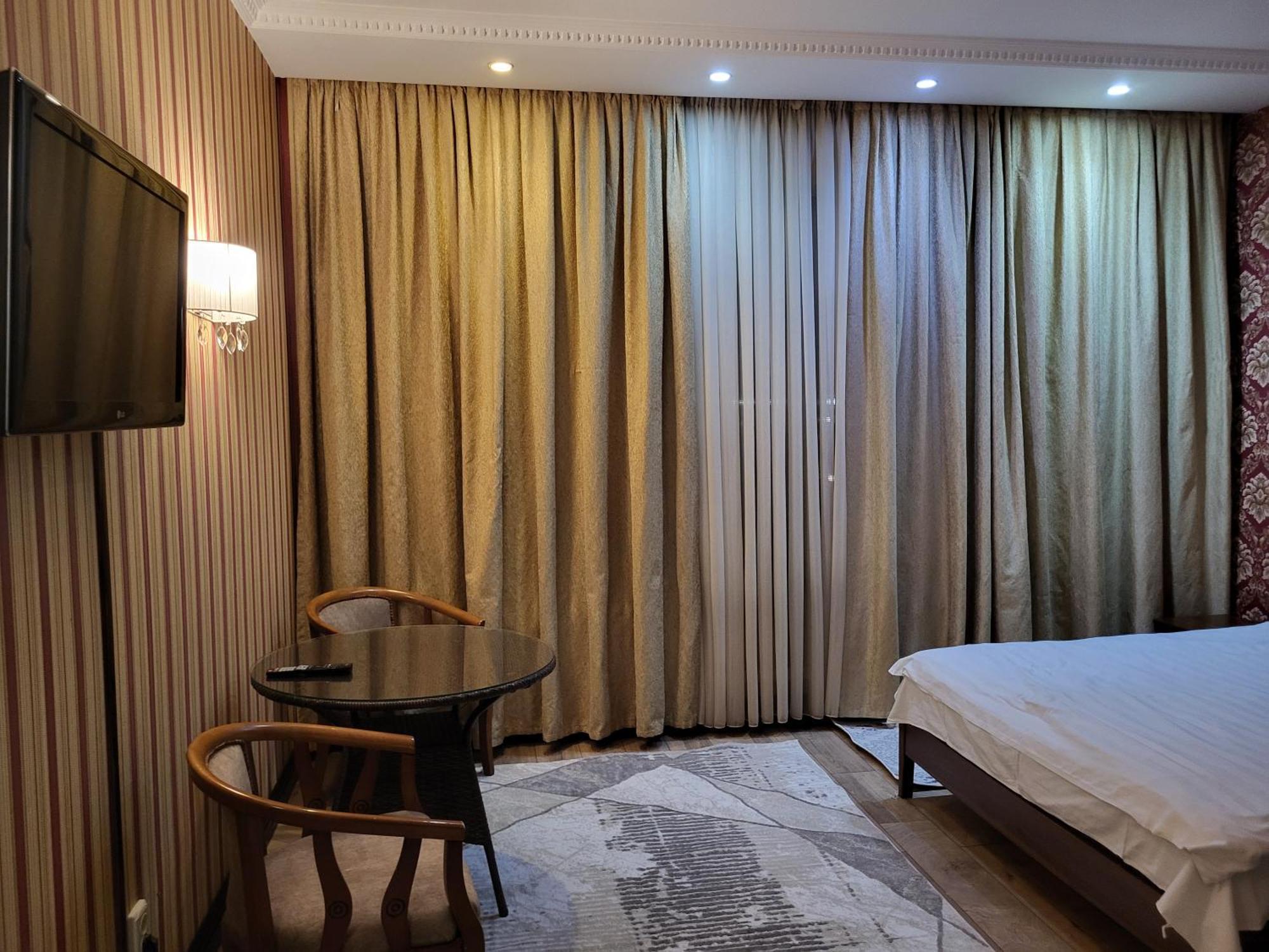Seoul Hotel Sjymkent Rum bild